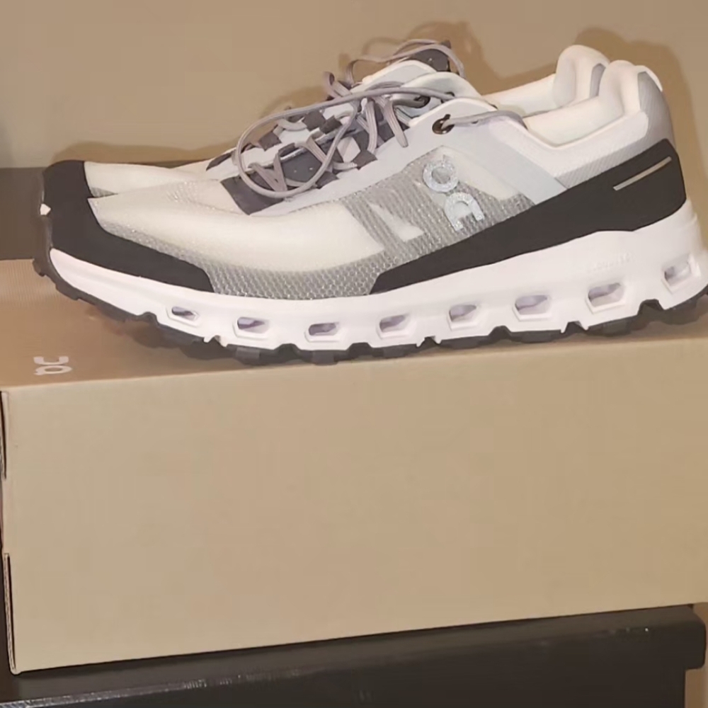 On Running White and Gray Sneakers with Breathable Mesh